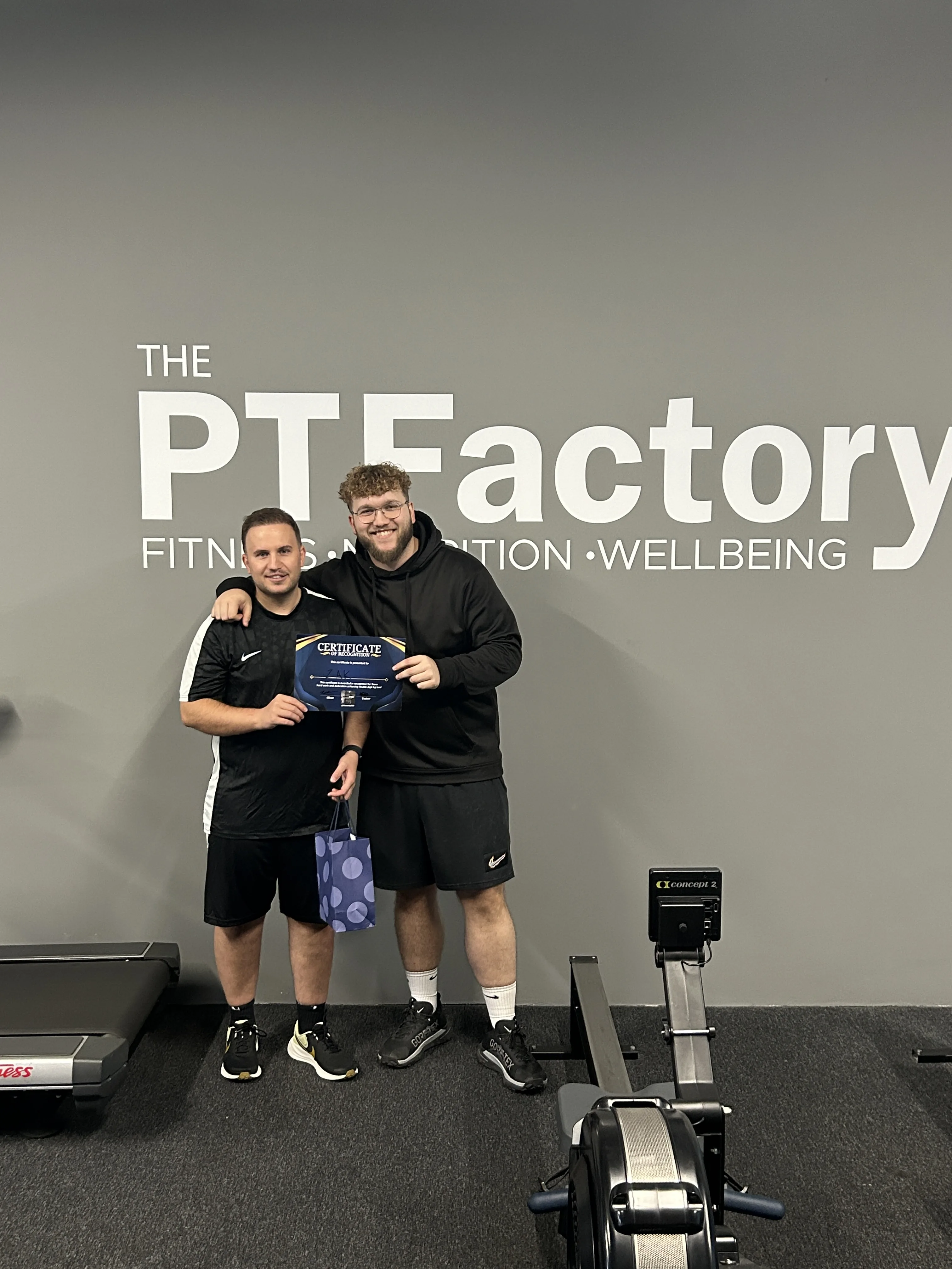 Kallum with Zak celebrating his weight loss achievement at The PT Factory